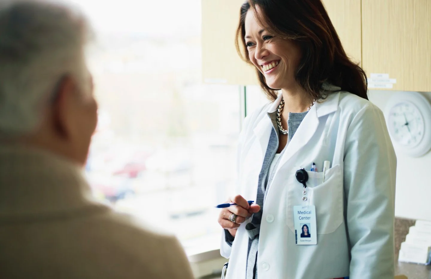 Provider smiling in an office